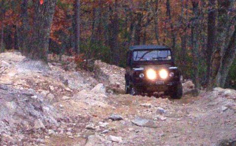 1995 Ford Bronco - Defender 90 stuck This is looking DOWN rocky mountain hill climb...about 45 degree hill, LOTS of loose stuff