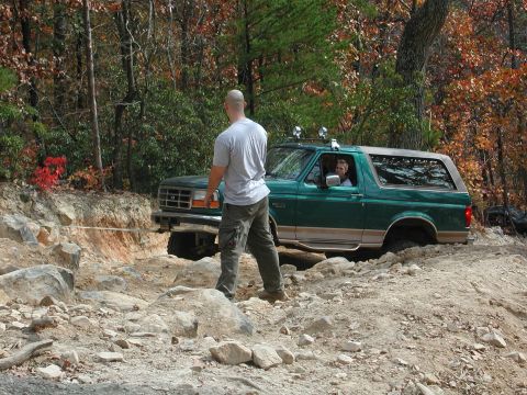 1985 Ford Bronco - murauder being winched through the middle line