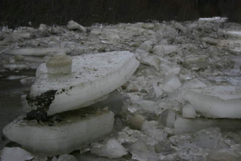 2003 Jeep TJ - A scene of broken ice chunks and debris, suggesting a frozen or thawing environment.