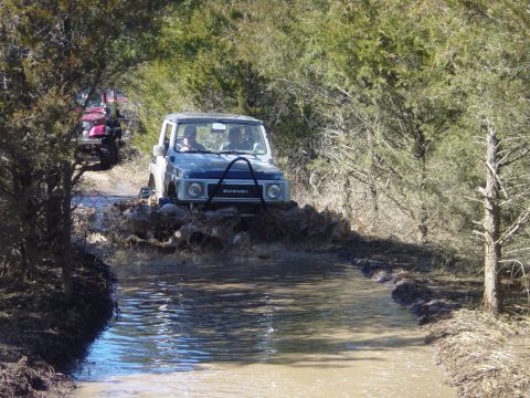 1974 Ford Bronco - Chris' Samuri playing in the Missouri mud
