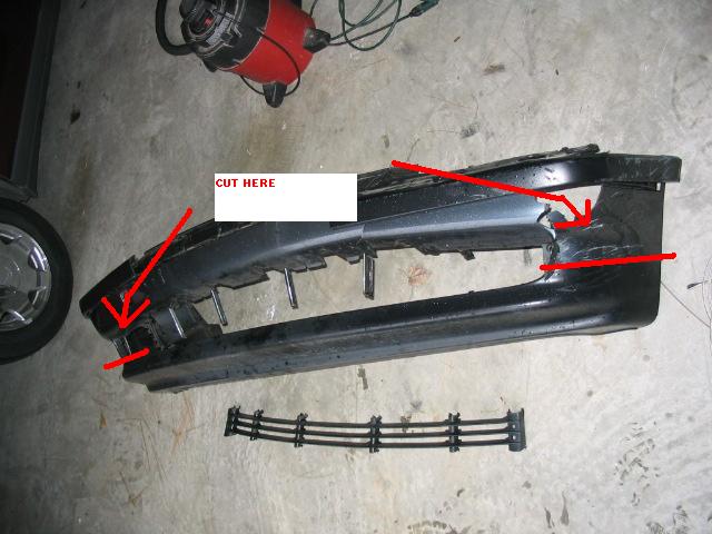 Front bumper part with red arrows indicating cuts and damage