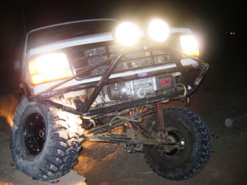 1985 Ford Bronco - This modified 1992 Ford F-150 features a custom front bumper with a winch and auxiliary lighting.