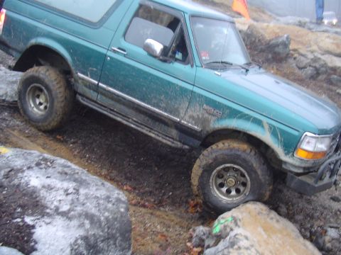 1993 Ford Bronco - This 1993 Ford Bronco navigates a rocky obstacle course, demonstrating its off-road capabilities.