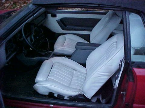 1991 Ford LTD Crown Victoria - Interior of a convertible showing the seats, dashboard, and steering wheel.