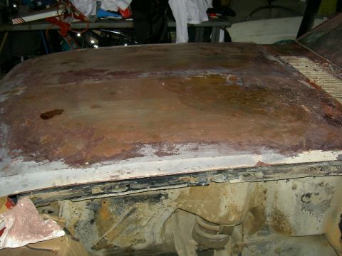 1965 Ford Mustang - Gonna toss this hood. Anyone want a messed up hood? The front is all dented in.