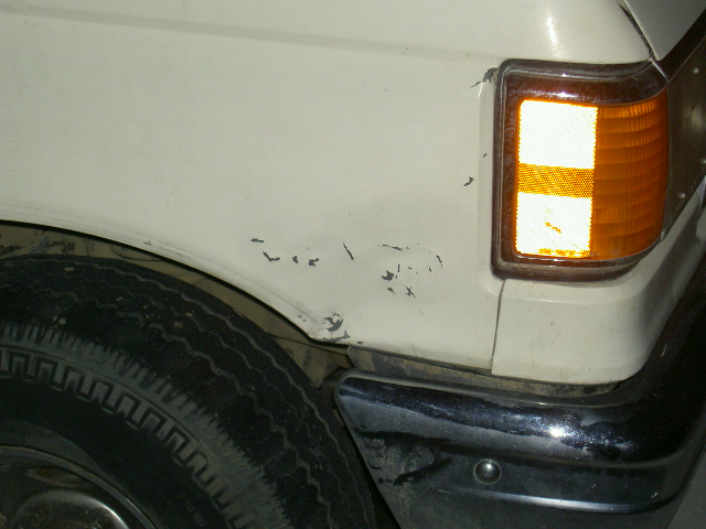 My Messed Up Fender.
You can't see all that well but it bows in about an inch there.
