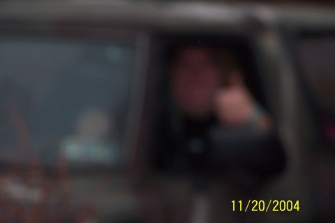 1979 Ford Bronco - A person is seen through the window of a vehicle, with a date stamp visible in the corner.