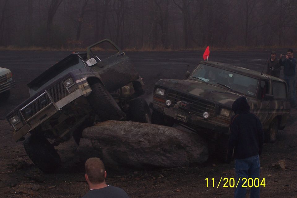 1979 Ford Bronco navigating rocks, front grille visible