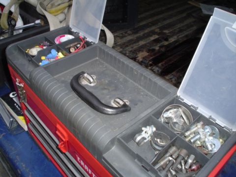 1981 Ford Bronco - heres the top of the box. I keep fuzes, P clamps, hose clamps, zip ties, bolts, nuts, screws, screwdriver bits and many electrical terminals