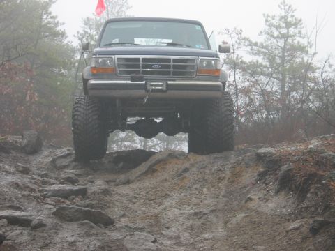 1995 Ford Bronco - This 1995 Ford Bronco navigates a challenging rocky and muddy trail.