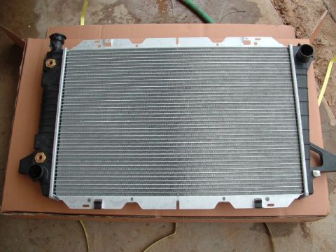 1990 Ford Bronco - This is a radiator, likely for a vehicle, shown from the front.