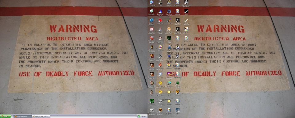 Screenshot of desktop with 'WARNING RESTRICTED AREA' sign wallpaper and icons