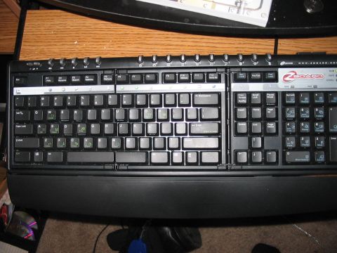 1988 Ford Bronco - A split ergonomic keyboard with a wrist rest is shown on a desk surface.