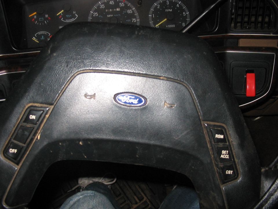 1988 Ford Bronco interior with Ford steering wheel and dashboard gauges