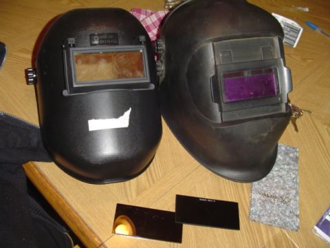 1993 Ford Bronco - Two welding helmets are shown with spare lenses, suggesting preparation for welding work.