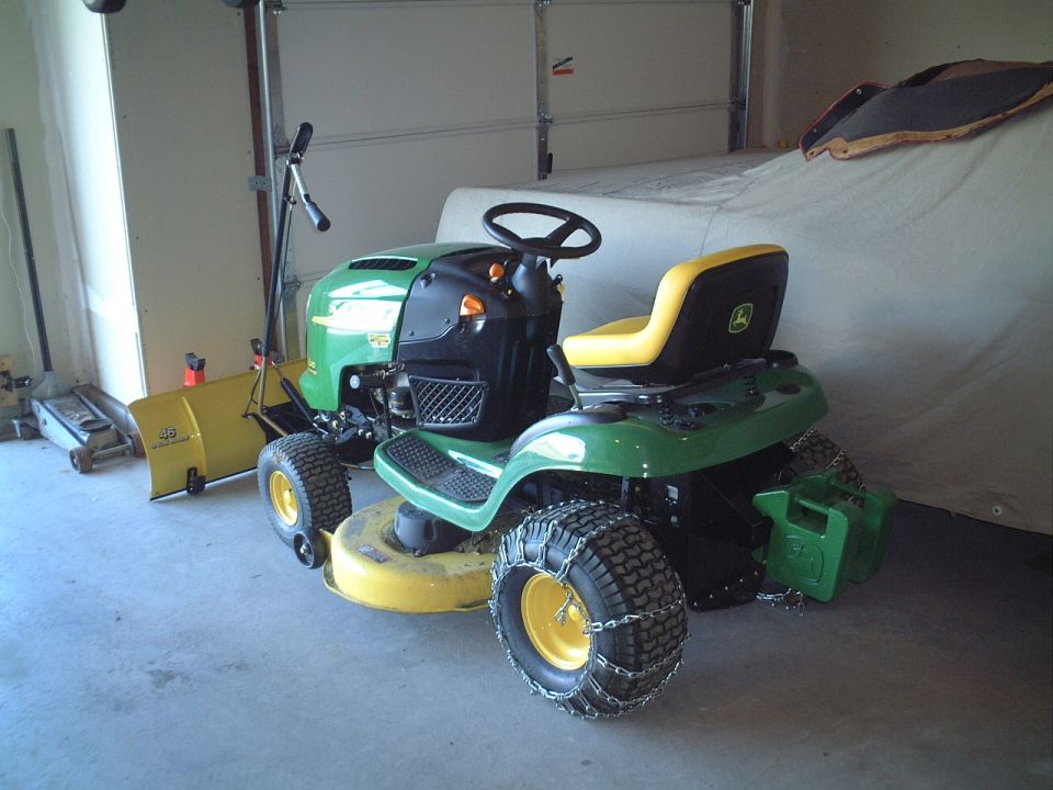 Weights and chains should provide good traction on the snow...can't wait to give it its first test-run.