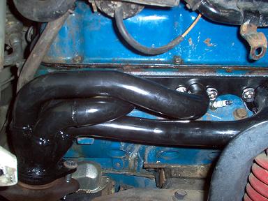 1988 Ford Bronco - Header bolts were a challenge to get, but, not as hard as when I installed my Hedman Headers.. Passenger side.