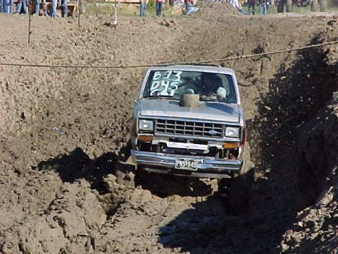 1987 Ford Ranger - This 1987 Ford Ranger navigates a challenging mud pit during an event.