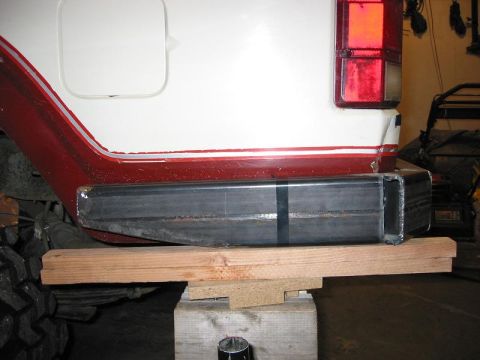 1985 Ford Bronco - Custom rear bumper installation on a white and red Ford Bronco.