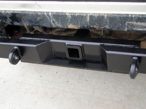 1995 Ford Bronco - Aftermarket rear bumper assembly with integrated tow hitch and recovery points.