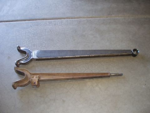 1993 Ford Bronco - Comparison of a new fabricated control arm next to an older, rusted one.