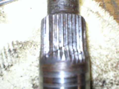 1978 Ford Bronco - Close-up of a damaged splined shaft, likely from a vehicle's steering or drivetrain system.