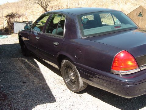 1999 Ford Crown Victoria - September 21, 2004 Driver's side far rear view in the driveway