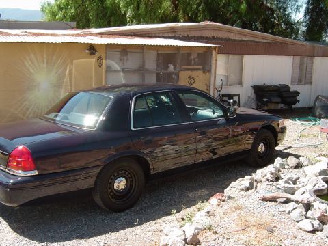 1999 Ford Crown Victoria - September 21, 2004 Passenger side far side view in the driveway.
