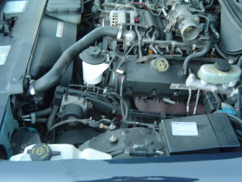 1999 Ford Crown Victoria - September 26, 2004 Side view of engine compartment with intake box and pipe removed.