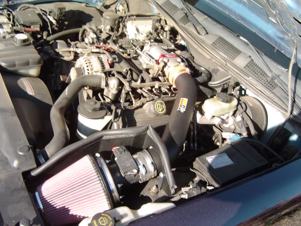 September 26, 2004
Side view of complete K&N Cold Fuel Injection Performance Kit and Poweraid throttle body spacer installed.