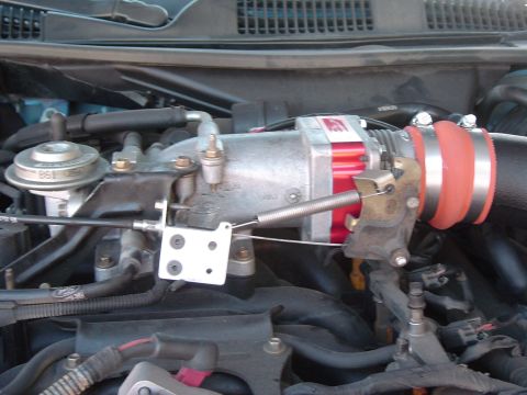 1999 Ford Crown Victoria - September 26, 2004 Close up uf completed Poweraid throttle body spacer installation.