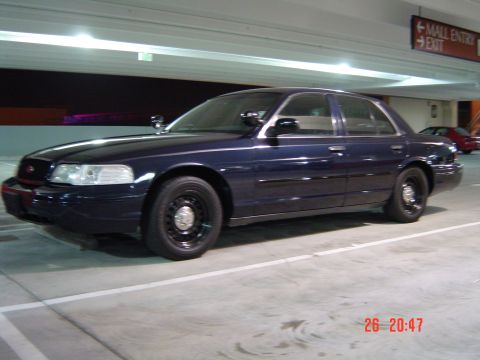 1999 Ford Crown Victoria - November 26, 2004 Driver's side front low.