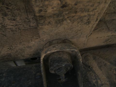 1978 Ford Bronco - Close-up view of an underbody suspension component, a watermark for Supermotors.net.