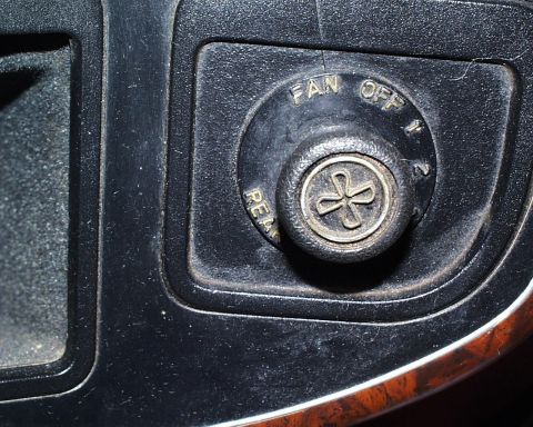1988 Ford C-350 (Centurion Conversions) - A close-up shot of a vehicle's interior fan control knob, showing various settings for fan speed and operation.