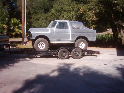 1978 Ford Bronco - A classic 1978 Ford Bronco is loaded onto a trailer, ready for its next stage of restoration.