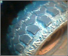 1995 Ford Bronco - A detailed view of a tire's tread pattern is visible.