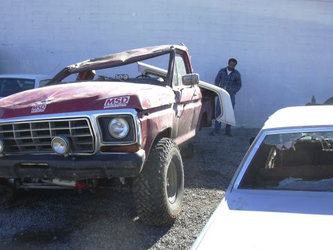 1978 Ford Bronco - This 1978 Ford Bronco has been significantly damaged, with its roof crushed and doors ajar.