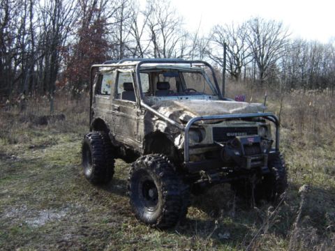 1992 Ford Bronco - This heavily modified Suzuki Samurai features oversized tires and a custom roll cage, ready for off-road adventures.