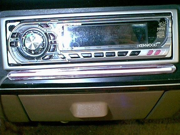 Kenwood car stereo with Sirius radio, digital display, and buttons