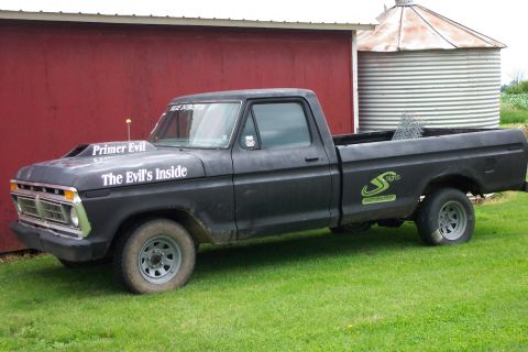 1977 Ford F-150 - This 1977 Ford F-150 pickup truck has a custom hood scoop and "The Evil's Inside" decal on the hood.