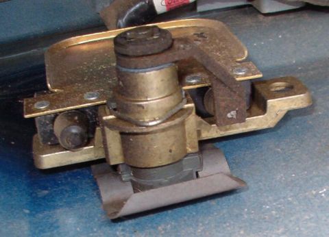 1983 Ford Bronco - When the key is rotated CW, the paddle presses the lower switch. The silver hairpin clip retains the switch assembly on the lock cylinder.…