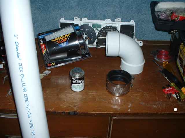 Dashboard instrument cluster with plumbing parts and a high flow air filter
