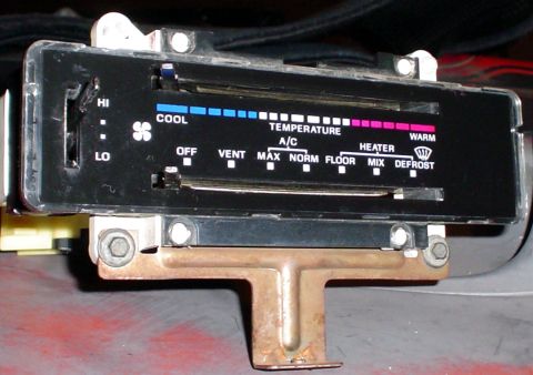 1978 Ford Mustang II - This is a close-up view of a vehicle's climate control unit, showing various settings for temperature and airflow.