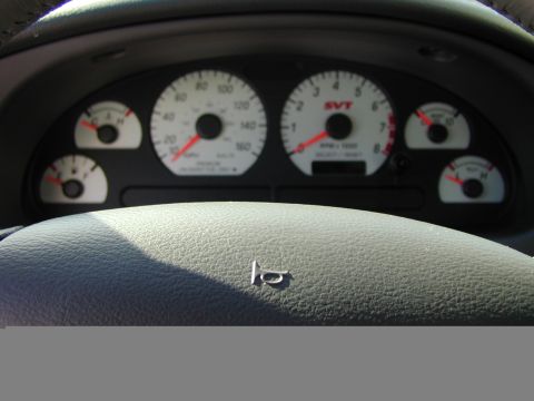 1979 Ford Bronco - Interior view of a vehicle's dashboard gauges, including a speedometer and tachometer.