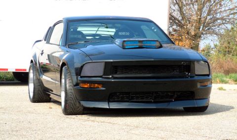 1973 Ford Ranchero - This modified Ford Mustang features a custom hood scoop and aggressive stance.