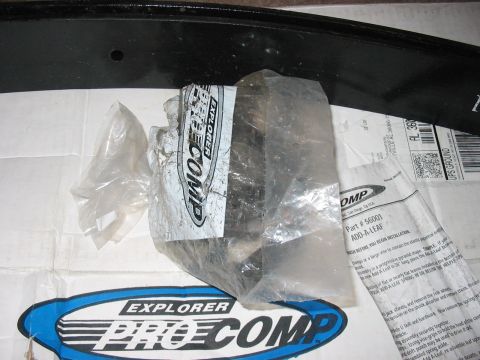 1988 Ford Bronco - A Pro Comp add-a-leaf kit is shown, including packaging and installation instructions.