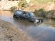 1988 Ford Bronco - 1988 Ford Bronco navigating a river crossing.