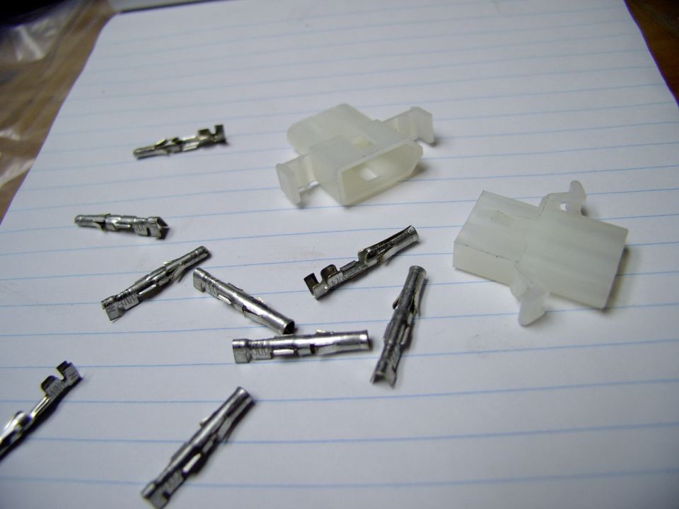 These plugs are available at any electronic surplus store real cheap and allow you to do this. Just solder the connectors on and plug them into the plastic male and female housings (once you're sure of how the wires need to run).