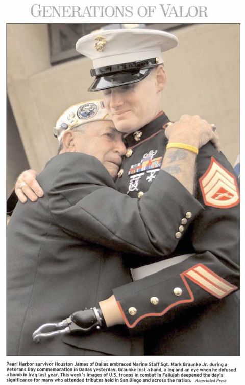 1988 Ford Bronco - A Pearl Harbor survivor embraces a Marine during a Veterans Day commemoration.