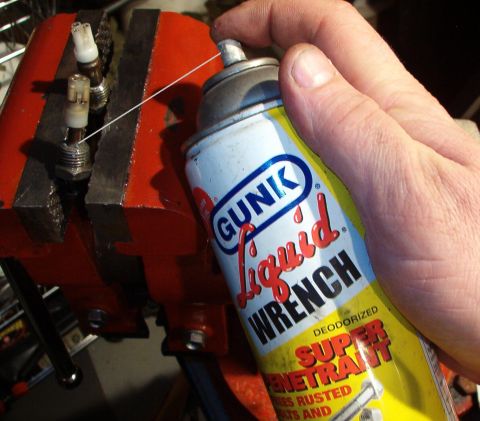 1983 Ford Bronco - Spray penetrating oil between the nut & the brass sleeve. See the NEXT pic...